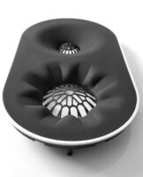 Prophecy-Mid-Tweet-063-1280px – NEXT Hi-Fi Ergonomic black lounge chair with a large circular seat and a honeycomb-like perforated core visible in the center, photographed from above.